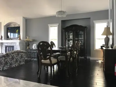 a dining room with a table and chairs at Lake and Bridge View Vacation Home in West Kelowna