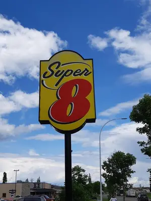 a sign for a super eight gas station at Super 8 by Wyndham Edson in Edson