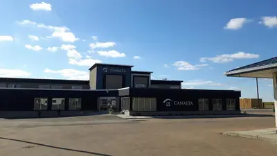 a black building with a carolina at Canalta Hanna in Hanna
