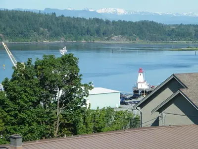 a view of a body of water with a lighthouse at Outdoor Lovers in Port Alberni