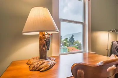 a table with a lamp on top of a table at Outdoor Lovers in Port Alberni