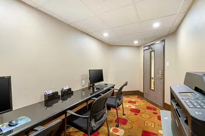 an office with a desk and chairs in a room at Best Western Northgate in Nanaimo