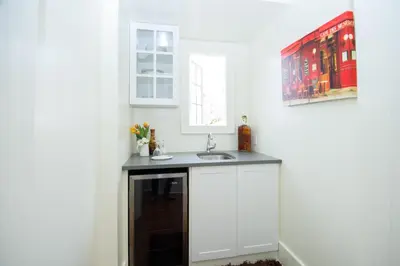 a bathroom with a sink and a window at The Craigmyle Inn in Victoria