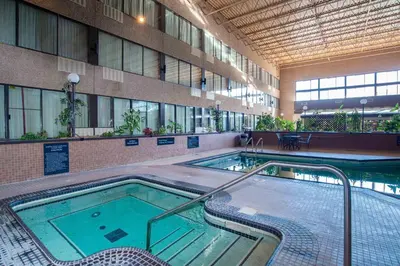 a large swimming pool in a building at Sandman Hotel Castlegar in Castlegar