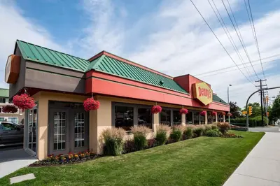 a mcdonalds restaurant with a green roof at Sandman Inn Kamloops in Kamloops
