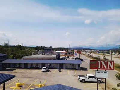 an empty parking lot in front of a motel at Howard Johnson by Wyndham Hinton in Hinton