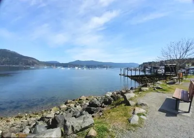 a view of a lake with boats in the water at Wessex Inn By The Sea in Cowichan Bay