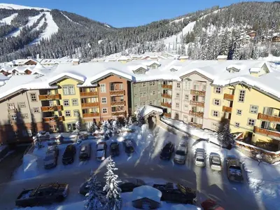 an aerial view of a resort in the snow at Holiday Home in Sun Peaks
