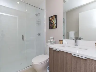 a bathroom with a toilet and a sink and a shower at City Centre in Victoria
