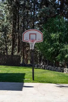a basketball hoop in the middle of a park at The Blue House Bed and Breakfast in Lake Country