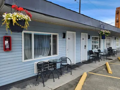 a table and chairs outside of a building at Ace Motel in Princeton