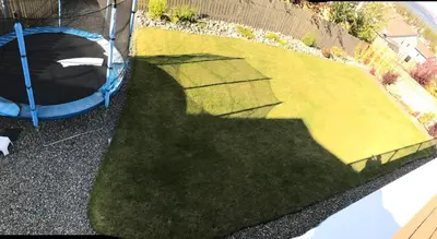 a shadow of a cross on the grass at 1st Choice Bed and Breakfast in Whitehorse