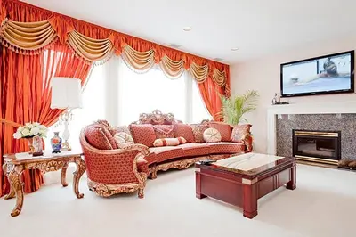 a living room with a couch and a fireplace at Harmony House in Richmond
