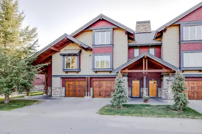 a large house with a garage at Pinnacle Ridge by StayIn in Fernie