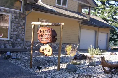 a sign in the front yard of a house at High Hopes Bed and Breakfast in Hope