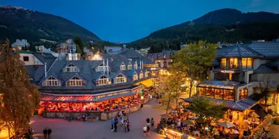 an overhead view of a market in a town at night at Wildflower Suite in Whistler