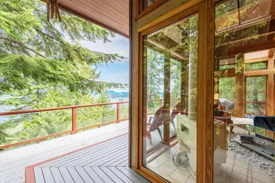 a view from the deck of a tree house at The Sanctuary Retreat Salt Spring Island in Salt Spring Island