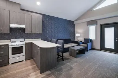 an open kitchen and living room in a apartment at Best Western Plus Prince George in Prince George