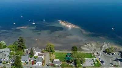 an aerial view of a small island in the water at The Wayward Inn in Chemainus
