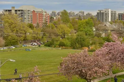 a park with a city in the background at Harbourview Executive Condo by EMR Vacation Rentals in Victoria