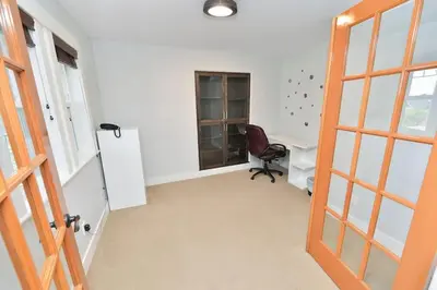 an office with a desk and a chair in a room at Nature's Gate Executive Estate by EMR Vacation Rentals in Victoria
