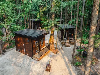 an overhead view of a small cabin in the woods at Boulder Mountain Resort in Revelstoke