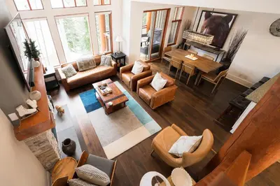 an aerial view of a living room with a piano at 3BR Luxury Home in Taluswood, Hot Tub, Ski In, Ski Out, Two-Car Garage, Village Parking in Whistler