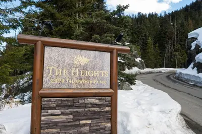 a sign for the heightsolisolisolisolisolisolisolisolisolisolisincial at 3BR Luxury Home in Taluswood, Hot Tub, Ski In, Ski Out, Two-Car Garage, Village Parking in Whistler