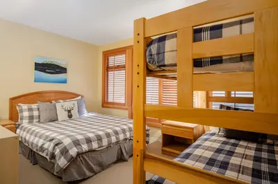 a bedroom with a bunk bed and a bunk bed at 3BR in Foxglove, Wood Burning Fireplace, Mudroom, Near Gondola, Parking in Whistler