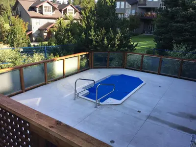 a trampoline on a patio on a balcony at 3BR in Blackcomb Greens, Wood Burning Fireplace, Complex Hot Tub, Parking, Mountain Views in Whistler