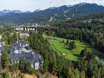an aerial view of a house in the mountains at 2BR in The Lynx, Family Sized, Mountain Views, Private Balcony, Tranquil Location, Parking in Whistler
