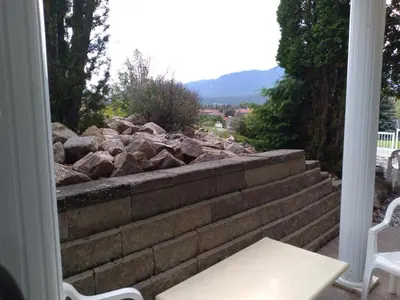 a stone retaining wall with a pile of rocks at Fairmont Mountain View Villas in Fairmont Hot Springs