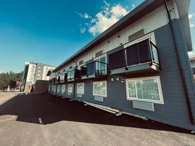 a building with windows on the side of it at Econo Lodge in Prince George