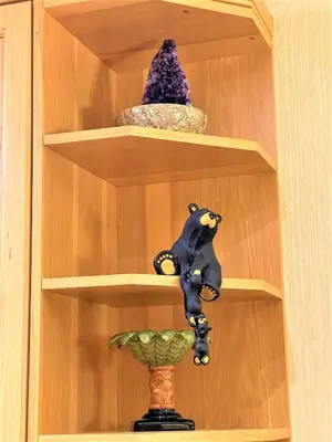 a shelf with a stuffed bear sitting on it at MountainView -PrivateChalet Sleep7- 5min to DT Vacation Home in Canmore