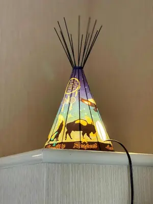a stained glass lamp sitting on top of a shelf at MountainView -PrivateChalet Sleep7- 5min to DT Vacation Home in Canmore