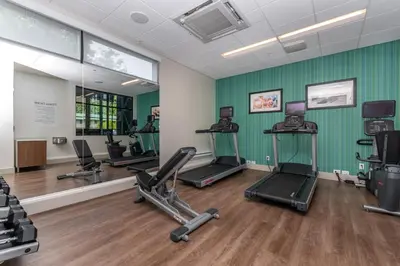 a gym with treadmills and exercise equipment in a room at Holiday Inn Express & Suites - Chilliwack East an IHG Hotel in Chilliwack