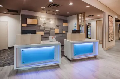 a lobby of an office with two blue screens at Holiday Inn Express & Suites - Chilliwack East an IHG Hotel in Chilliwack