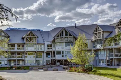 an exterior view of a large building at Greystone Lodge 412 Renovated in Whistler
