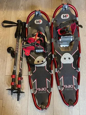 a skateboard on a table with some tools on it at Windtower Lodge FullKitchen-Kingbed Suite-MntView-UGParking-Walk2DT in Canmore