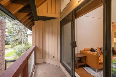 an internal view of a house with sliding glass doors at Snowberry by Outpost Whistler in Whistler