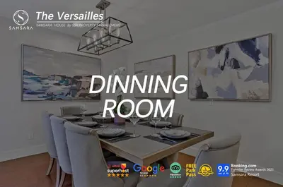a dining room with a dining room table and chairs at The Versailles by Samsara Resort Top Luxury Top View 1300SQF 2BEDROOM 2BATHROM in Canmore