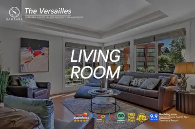 a living room with a couch and a table at The Versailles by Samsara Resort Top Luxury Top View 1300SQF 2BEDROOM 2BATHROM in Canmore
