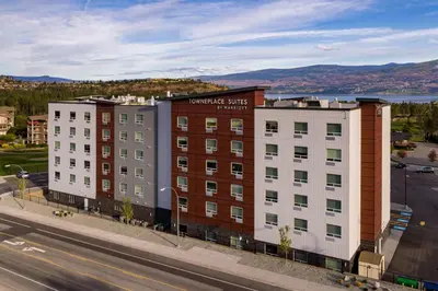 an aerial view of three buildings on a city street at TownePlace Suites by Marriott West Kelowna in West Kelowna