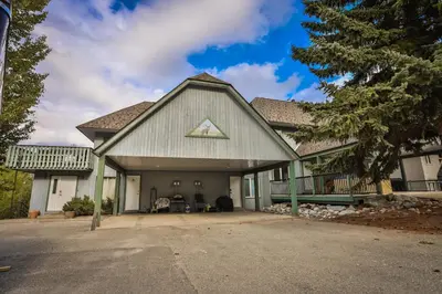 a large white house with a roof at Silver Birch by StayIn in Kimberley