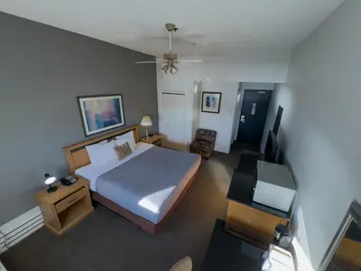 an overhead view of a bedroom with a bed at The Met Hotel in New Westminster