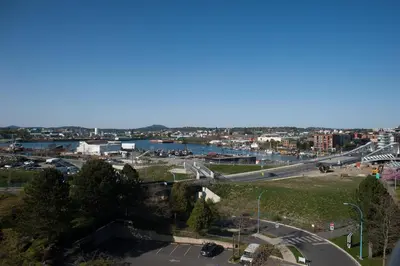 a view of a city with a bridge and a river at Delta Hotels by Marriott Victoria Ocean Pointe Resort in Victoria