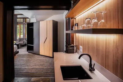 a kitchen with a sink and a counter top at Nita Lake Lodge in Whistler