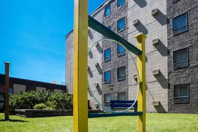 a sculpture in front of a building at Travelodge by Wyndham Edmonton West in Edmonton