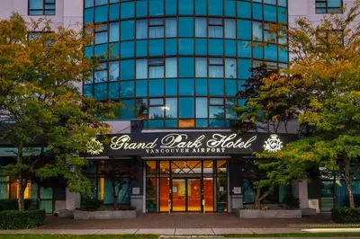 a building with a sign that reads grand kids school at Grand Park Hotel Vancouver Airport, an Ascend Collection Hotel in Richmond