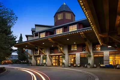a building with a tower on top of it at Delta Hotels by Marriott Whistler Village Suites in Whistler